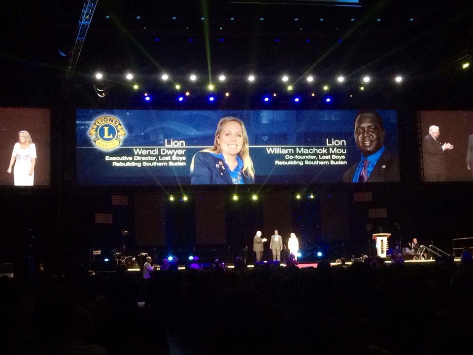 Wendi Dwyer and William Mou on Jumbotron at the 97th Annual Lions Clubs International Convention in Toronto